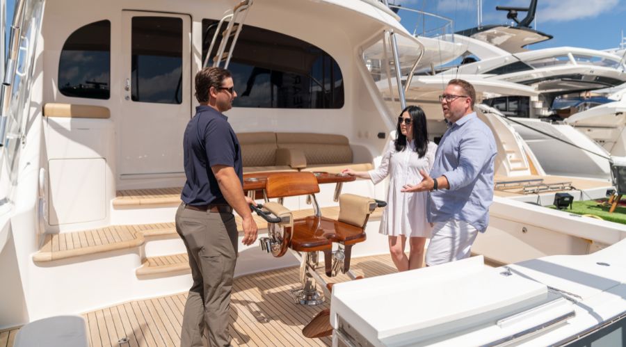 yacht broker onboard with customers
